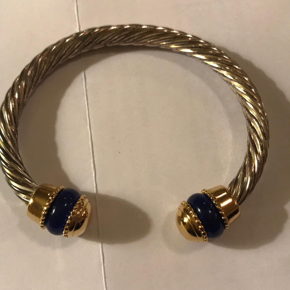 Heavy stainless bracket w blue stones. Like new